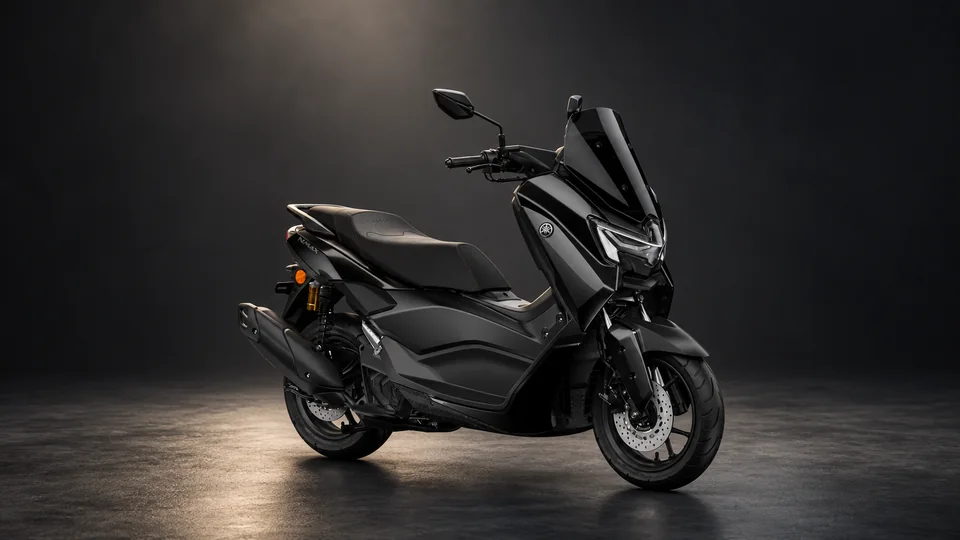 Cinematic studio view of a black Yamaha NMAX scooter